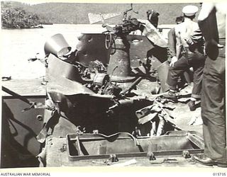1943-09-20. NEW GUINEA. BUSO RIVER. LAE AREA. AN ALLIED LANDING CRAFT DAMAGED BY JAPANESE BOMBS. (NEGATIVE BY H. DICK)