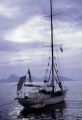 French Polynesia, 'Nomad' sailboat anchored off shore of Tahiti Island