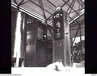 BOMANA, NEW GUINEA. 1943-11-08. THE "OZONATOR" WATER PURIFICATION PLANT IN THE BOMANA PUMPING STATION. THIS UNIT SUPPLIES PORT MORESBY WITH 1,000,000 GALLONS OF FILTERED WATER DAILY