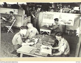 KOITAKI, PORT MORESBY AREA, NEW GUINEA. 1944-03-27. A GENERAL VIEW FROM THE ENTRANCE TO THE LIBRARY OF THE AUSTRALIAN ARMY EDUCATION SERVICE ATTACHED TO THE 113TH CONVALESCENT DEPOT. IDENTIFIED ..