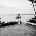 Coffin being conveyed to Pataliga grave islet