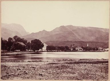 Houses by the water, mountains in the distance. From the album: Tahiti, Samoa and New Zealand scenes