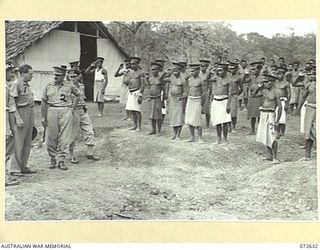 FINSCHHAFEN AREA, NEW GUINEA. 1944-04-25. THE HONOURABLE E.J. WARD, MINISTER FOR EXTERNAL TERRITORIES IN THE AUSTRALIAN GOVERNMENT (1), ACCOMPANIED BY MAJOR-GENERAL B.M. MORRIS, DSO, GOC AUSTRALIAN ..