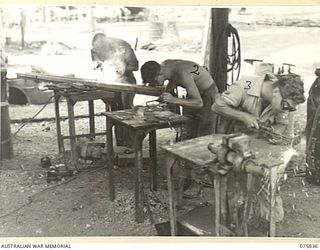 ALEXISHAFEN, NEW GUINEA. 1944-09-13. NX193906 CORPORAL J. MCMANUS (1); N15174 CRAFTSMAN G.J. PUNCH (2) AND NX190425 CRAFTSMAND J.G. BARRETT (3) OPERATING OXY-ACETYLENE AND ELECTRIC WELDING ..