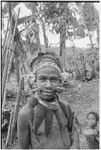 Pig festival, singsing preparations, Tsembaga: boy wears marsupial fur ornaments and other finery