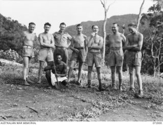 ILOLO, NEW GUINEA. 1944-04-30. PERSONNEL OF THE OWERS' CORNER SIGNAL STATION, 18TH AUSTRALIAN LINES OF COMMUNICATION SIGNALS, LEFT TO RIGHT: STANDING: EX7410 SERGEANT K. CARLETON; VX23880 SIGNALMAN ..