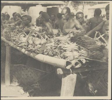 Trestle table laden with beans and other produce, Boong, native market, Rabaul, New Guinea, ca. 1936 / Sarah Chinnery