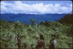 View of the interior of Malaita with people in foreground