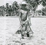 A boy with his canoe