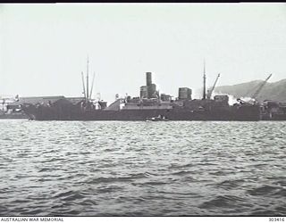 PORT MORESBY, PAPUA. STARBOARD SIDE VIEW OF THE CARGO VESSEL ILLIAGUER. (NAVAL HISTORICAL COLLECTION)