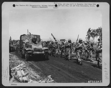 Marines Marching Back From The Front On Bougainville, Solomon Islands, Where They Had Been Fighting Japs A Short Distance Back In The Jungle. 1943. (U.S. Air Force Number 67333AC)