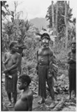 Bride price ritual: decorated man with painted face