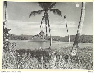 ALEXISHAFEN, NEW GUINEA. 1944-04-27. A UNITED STATES NAVY DESTROYER TURNING INSIDE THE HARBOUR AFTER UNLOADING TROOPS