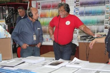Jack Synnott, Hazard Mitigation Branch Director, conducts an on-location radio interview with Gary Sword from KKMP at the True Value in Saipan. FEMA Hazard Mitigation specialists have been answering questions at True Value Hardware, ACE Hardware, and Do It Best Hardware stores in an effort to help Typhoon Soudelor survivors build back better and stronger. They are providing information for preventing damages to your home and for protecting your family from typhoons and flooding. Hazard Mitigation is any action taken to reduce or eliminate the long term risk to people and property from natural disasters. Hazard Mitigation projects may include, but are not limited to rebuilding, flood-proofing, and building stronger.