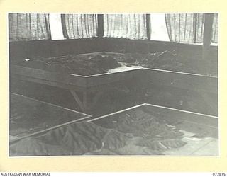 PORT MORESBY, NEW GUINEA, 1944-05-01. SAND RELIEF MODELS IN THE PLANNING HUT, G BRANCH, HEADQUARTERS NEW GUINEA FORCE