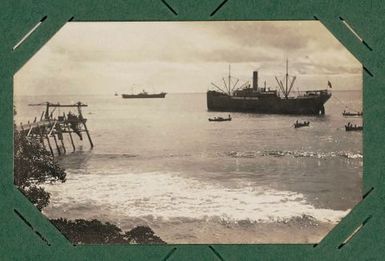 Ships with lighters near wharf, Tabawa, Ocean Island.  From the album: Banaba (Ocean Island)
