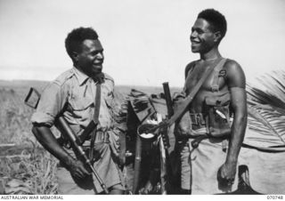 KELANOA, NEW GUINEA. 1944-03-04. 480 CORPORAL SALA, MM, (1) PICTURED WITH ANOTHER MEMBER OF "A" COMPANY, 1ST PAPUAN INFANTRY BATTALION, 417 WILLIAM MATPI (2), WHO WITH 110 JAPANESE TO HIS CREDIT, ..