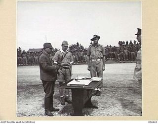 CAPE WOM, NEW GUINEA, 1945-09-13. LIEUTENANT-GENERAL H. ADACHI, COMMANDER 18 JAPANESE ARMY IN NEW GUINEA, FORMALLY SURRENDERED TO MAJOR-GENERAL H.C.H. ROBERTSON, GENERAL OFFICER COMMANDING 6 ..