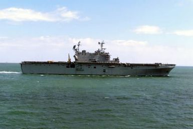 Starboard side view of the US Navy (USN) TARAWA CLASS: Amphibious Assault Ship USS SAIPAN (LHA 2) underway off the coast of Virginia Beach, Virginia (VA)