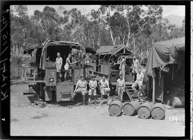 World War 2 soldiers in front of lorries, New Caledonia