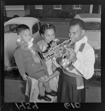 Ponsonby Samoan bandsman with family and cornetts