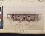 Men outside college building, Port Moresby, Papua New Guinea, ca. 1890