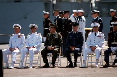 Distinguished guests, including Marine Sergeant Major Allan J. Kellogg, right, Medal of Honor recipient for duty in Vietnam, and Air Force General Jerome O'Malley (2nd from right), commander-in-chief of Pacific Air Forces, attend a ceremony to honor the Unknown Serviceman of the Vietnam Era