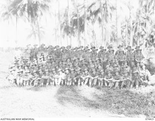 MADANG, NEW GUINEA. 1944-06-30. PERSONNEL OF D COMPANY, 24TH INFANTRY BATTALION. IDENTIFIED PERSONNEL ARE:- VX14091 LANCE CORPORAL T.W. REGAN (1); VX139868 CORPORAL R.H. PAGE (2); VX104531 CORPORAL ..