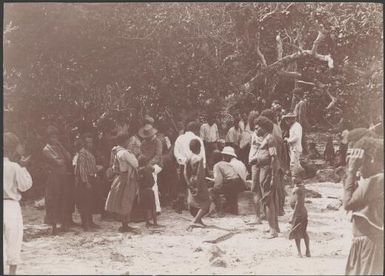 Missionaries distributing teachers pay at Tarasag, Santa Maria, Banks Islands, 1906 / J.W. Beattie