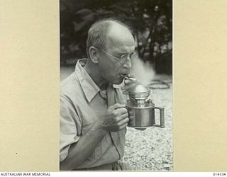 1943-02-25. NEW GUINEA. ARCHDEACON STEPHEN ROMNEY MAURICE GILL WHO HAS ARRIVED IN PORT MORESBY AFTER BEING IN THE BATTLE ZONE FOR SEVEN MONTHS. ARCHDEACON GILL, WHOSE HEAD MISSION IS AT DUVIRA AT ..