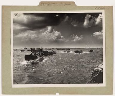 Photograph of American Ships and Landing Craft Approaching Saipan