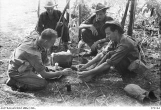 HANSA BAY-BOGIA HARBOUR, NEW GUINEA. 1944-08-09. TROOPS OF THE 30TH INFANTRY BATTALION RECEIVING TREATMENT FROM THE UNIT REGIMENTAL AID POST SERGEANT AT THEIR CAMP AT THE MOUTH OF THE RAMU RIVER ON ..