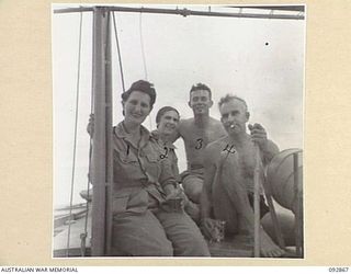 JACQUINOT BAY AREA, NEW BRITAIN. 1945-05. AUSTRALIAN ARMY NURSING SERVICE SISTERS AND TROOPS RELAXING ON A LAUNCH DURING THE WEEKEND. IDENTIFIED PERSONNEL ARE:- SISTER M.M. WILSON, 105 CASUALTY ..