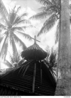 PORT MORESBY, PAPUA. C. 1943. RAAF CHAPLAIN PADRE DEBENHAM'S "LITTLE CHURCH AMONG THE COCONUTS"