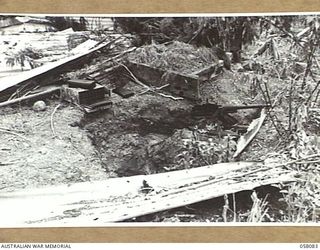 KAKAKOG AREA, NEW GUINEA, 1943-10-02. A JAPANESE 13MM GUN CAPTURED BY AUSTRALIAN TROOPS