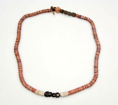 Necklace decorated with stones and sago seeds