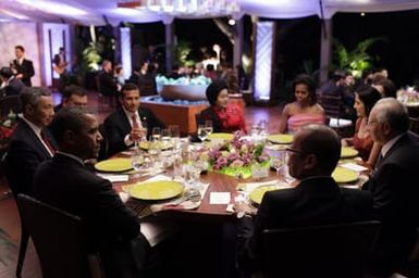 Barack Obama and Michelle Obama attend the Leaders Dinner at the APEC summit in Honolulu, Hawaii, November 12, 2011
