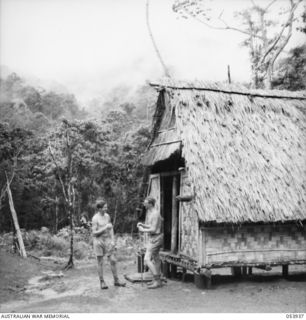 UBERI, NEW GUINEA. 1943-07-08. TEST POINT AND LINESMAN'S CAMP OF THE 18TH NEW GUINEA LINES OF COMMUNICATION AREA SIGNALS, AIF, NEAR THE COMMENCEMENT OF THE KOKODA TRAIL. THESE CAMPS ARE MANNED BY ..