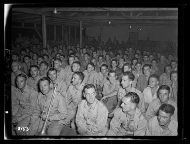 Members of the New Zealand Army 38th Field Regiment in a hall