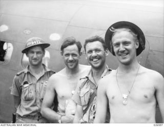 The happy crew of Lockheed Hudson A16-246 of 6 Squadron RAAF after their return from attacking Japanese destroyers which had been shelling Australian positions in Milne Bay during the final phase ..