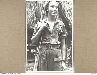 FAITA, RAMU VALLEY, NEW GUINEA. 1944-01-07. NX122323 TROOPER L. C. E. COLLINS OF WOOLOOMOOLOO, NSW, A MEMBER OF NO. 1 SECTION, A TROOP, 2/2ND COMMANDO SQUADRON