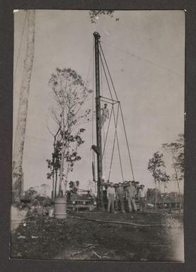 [Group of Servicemen at Water Pump]