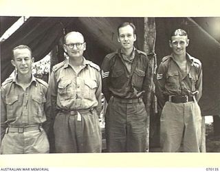 RAMU VALLEY, NEW GUINEA. 1944-02-04. STAFF OF THE ASSISTANT DIRECTOR OF ORDNANCE SERVICE AT 7TH DIVISION HEADQUARTERS. IDENTIFIED PERSONNEL ARE: QX10176 ACTING WARRANT OFFICER II, J.A. HOWARD (1); ..