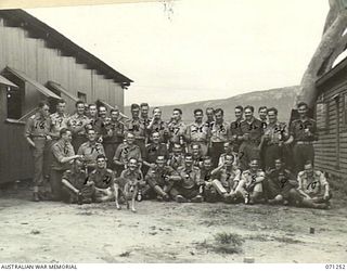 OONOONBA, QUEENSLAND, AUSTRALIA, 1944-03-11. A GROUP OF BRITISH OFFICERS WHO HAVE BEEN FIGHTING IN NEW GUINEA, PHOTOGRAPHED AT THE 13TH AUSTRALIAN PERSONNEL STAGING CAMP. MAJOR B.L.M. TOMLINSON, A ..