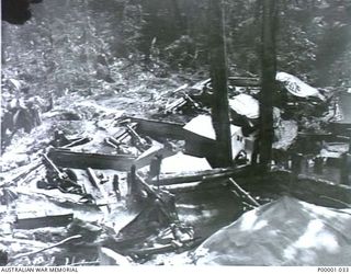 THE SOLOMON ISLANDS, 1945-01-12. GENERAL VIEW OF AN AIF 25 POUND BATTERY. (RNZAF OFFICIAL PHOTOGRAPH.)