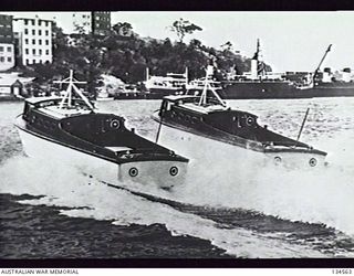 SYDNEY, NSW. TWO RAAF TYPE O8- CRASH LAUNCHES UNDERGOING TRIALS ON THE HARBOUR, PRIOR TO LEAVING FOR SERVICE AT THE MORESBY MARINE SECTION. (DONOR: P. E. ANDREAS)