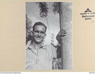 SANGARA, NEW GUINEA, 1945-07-08. MR C. NICHOLAS, ASSISTANT MANAGER, SANGARA RUBBER PLANTATION. HE WAS BORN IN SUMATRA AND FORMERLY WORKED ON THE GOODYEAR PLANTATION AT SUMATRA. WITH HIS PARENTS AND ..