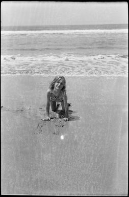 Margaret Hare on a beach