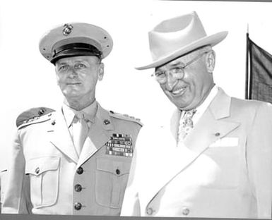 Former President Harry S. Truman with an unidentified Marine General in uniform at the Marine Corps Air Station, Kaneohe Bay, Hawaii
