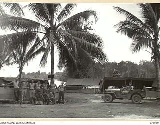 JACQUINOT BAY, NEW BRITAIN. 1945-02-03/01. THE DUMP AND MEMBERS OF THE STAFF OF THE ASSISTANT DIRECTOR OF ORDNANCE SERVICES AT THE BONDI BEACHHEAD